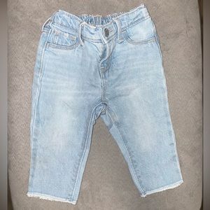 Light blue baby girl jeans either fringe bottom